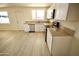 Modern kitchen with white cabinets, granite countertops and stainless steel appliances at 4901 W Cheery Lynn Rd, Phoenix, AZ 85031