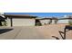 Single-story home with attached garage and driveway at 5124 W Onyx Ave, Glendale, AZ 85302