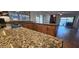 Spacious kitchen featuring granite countertops and modern cabinetry at 5124 W Onyx Ave, Glendale, AZ 85302