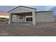 Covered patio in the backyard with sunset view at 5403 S 360 Th Ave, Tonopah, AZ 85354