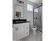 Modern bathroom featuring a sleek vanity, elegant mirror, and a glass-enclosed shower with marble-style tile at 5403 S 360 Th Ave, Tonopah, AZ 85354