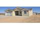 Single-story home featuring a neutral paint scheme and a desert landscape at 5403 S 360 Th Ave, Tonopah, AZ 85354