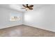 Spacious bedroom with large window and ceiling fan at 5406 W Hearn Rd, Glendale, AZ 85306