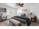 Main bedroom with a king-size bed and calming color scheme at 5406 W Hearn Rd, Glendale, AZ 85306