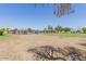 Inviting community pool area with grassy lawn at 5406 W Hearn Rd, Glendale, AZ 85306