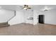 Small kitchen area with black refrigerator and microwave at 5406 W Hearn Rd, Glendale, AZ 85306