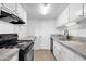 Efficient kitchen featuring black appliances and ample cabinetry at 5406 W Hearn Rd, Glendale, AZ 85306