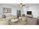 Spacious living room featuring a neutral color palette and stylish decor at 5406 W Hearn Rd, Glendale, AZ 85306