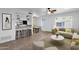 Bright living room with contemporary furniture and a ceiling fan at 5406 W Hearn Rd, Glendale, AZ 85306