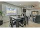 Dining area with dark wood table set with a modern black ceiling fan at 6366 N 19Th St, Phoenix, AZ 85016