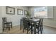 Dining area with dark wood table set adjacent to bright window at 6366 N 19Th St, Phoenix, AZ 85016