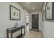 Entryway with light wood floors and contemporary decor at 6366 N 19Th St, Phoenix, AZ 85016