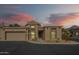 Charming home featuring a two-car garage, desert landscaping, and covered entryway at 6366 N 19Th St, Phoenix, AZ 85016