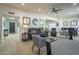 Bright living room featuring wood flooring, modern decor, and a ceiling fan at 6366 N 19Th St, Phoenix, AZ 85016