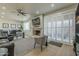 Open-concept living room with a cozy fireplace and natural lighting at 6366 N 19Th St, Phoenix, AZ 85016