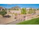 Community pool fenced in with a grass area at 6366 N 19Th St, Phoenix, AZ 85016