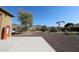 Spacious backyard with gravel and mountain views at 6416 W Parkside Ln, Glendale, AZ 85310