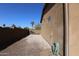 Large backyard with gravel and a side yard at 6416 W Parkside Ln, Glendale, AZ 85310