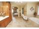 Spacious Primary bathroom with a jetted tub and separate shower at 6416 W Parkside Ln, Glendale, AZ 85310