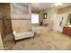 Elegant Primary bathroom with a soaking tub and walk-in shower at 6416 W Parkside Ln, Glendale, AZ 85310