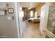 View into a bedroom with fireplace from hallway at 6416 W Parkside Ln, Glendale, AZ 85310