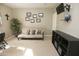 Bedroom with a daybed, home office and wall decor at 6416 W Parkside Ln, Glendale, AZ 85310