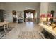 Elegant entryway with tile flooring, showcasing living and dining areas at 6416 W Parkside Ln, Glendale, AZ 85310