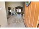 Bright entryway with tile flooring and views into living room at 6416 W Parkside Ln, Glendale, AZ 85310