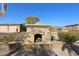 Stone fire pit in the backyard at 6416 W Parkside Ln, Glendale, AZ 85310