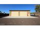 Large detached garage with double doors at 6416 W Parkside Ln, Glendale, AZ 85310