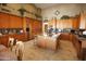 Large kitchen boasts an island and lots of wood cabinets at 6416 W Parkside Ln, Glendale, AZ 85310