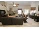 Spacious living room featuring a fireplace and ample seating at 6416 W Parkside Ln, Glendale, AZ 85310