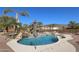 Inviting pool with waterfall feature at 6416 W Parkside Ln, Glendale, AZ 85310