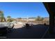 Relaxing pool area with patio furniture and mountain backdrop at 6416 W Parkside Ln, Glendale, AZ 85310