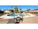 Resort style pool with waterfall and patio at 6416 W Parkside Ln, Glendale, AZ 85310