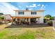 Expansive backyard with a covered patio area perfect for outdoor entertaining and relaxation at 6422 W Garden Dr, Glendale, AZ 85304