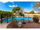 Private pool area surrounded by lush greenery, creating a tranquil outdoor oasis at 6422 W Garden Dr, Glendale, AZ 85304