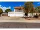 Charming two-story home with three-car garage and balcony in a well-maintained neighborhood at 6422 W Garden Dr, Glendale, AZ 85304