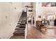 Open hallway view of dining room with high ceilings and staircase at 6422 W Garden Dr, Glendale, AZ 85304