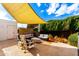 Inviting patio area with comfortable seating, creating an ideal outdoor living space at 6422 W Garden Dr, Glendale, AZ 85304