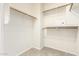 Large walk-in closet with ample shelving and hanging space at 6605 N 93Rd N Ave # 1082, Glendale, AZ 85305