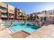 Inviting community pool with plenty of lounge chairs at 6605 N 93Rd N Ave # 1082, Glendale, AZ 85305