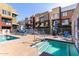 Community pool and spa with plenty of seating at 6605 N 93Rd N Ave # 1082, Glendale, AZ 85305