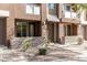 Exterior of a two-story townhome with a modern design and landscaping at 6605 N 93Rd N Ave # 1082, Glendale, AZ 85305