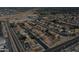 Wide aerial shot of a residential neighborhood featuring well-kept homes and roadways at 7461 W Tumblewood Dr, Peoria, AZ 85382