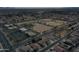 Wide-angle view of neighborhood, showcasing nearby sports fields and commercial development at 7461 W Tumblewood Dr, Peoria, AZ 85382