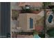 Aerial view of home showing solar panels on roof, backyard pool, and patio at 7461 W Tumblewood Dr, Peoria, AZ 85382