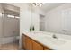 Bright bathroom features a sink vanity and a separate toilet and shower/tub combo at 7461 W Tumblewood Dr, Peoria, AZ 85382