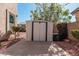 Storage shed in a desert landscaped side yard at 7461 W Tumblewood Dr, Peoria, AZ 85382