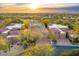 Luxury community home with a private garage and desert landscaping at 7500 E Boulders Pkwy # 11, Scottsdale, AZ 85266